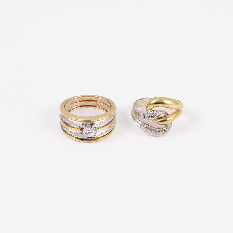 Anelli in oro giallo e bianco con diamanti, circa 0,25 ct