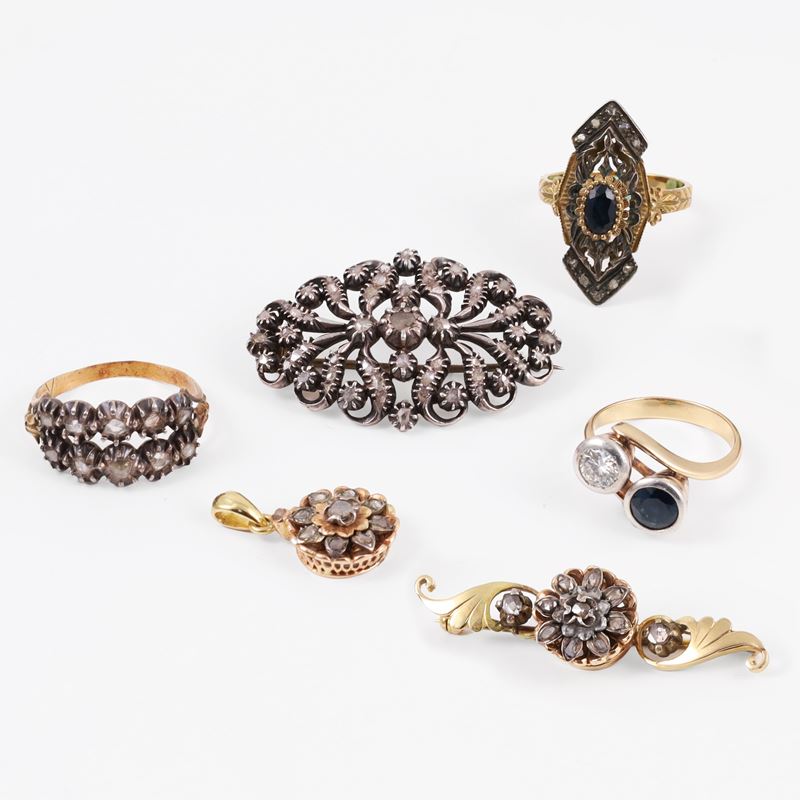 Collezione di Gioielli in oro e argento con diamanti e zaffiri