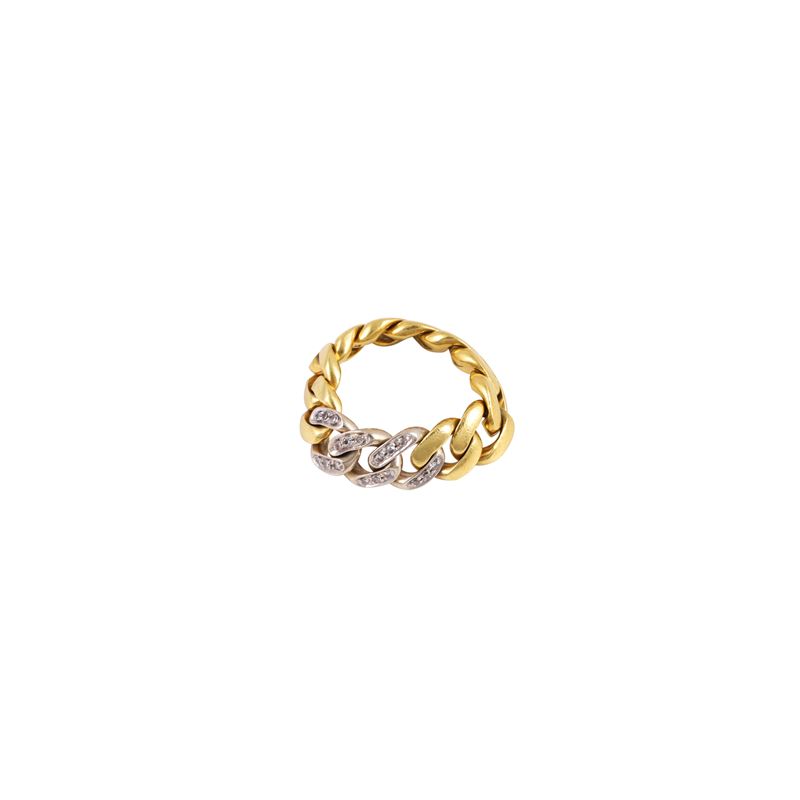 Anello in oro giallo e bianco con brillanti