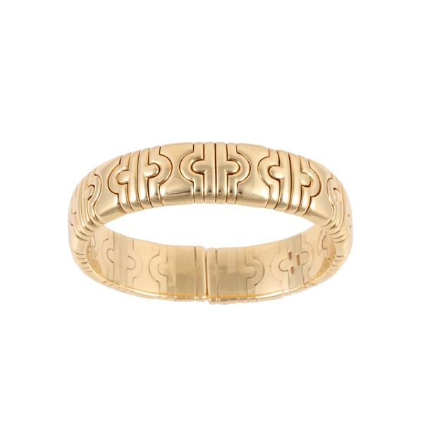 18KT GOLD BANGLE, BY BULGARI "Parentesi"