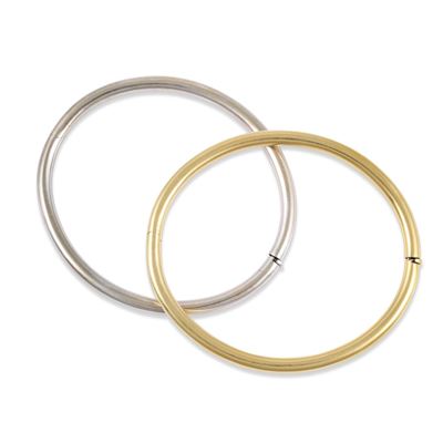 Due bracciali rigidi in oro bianco e giallo 18Kt