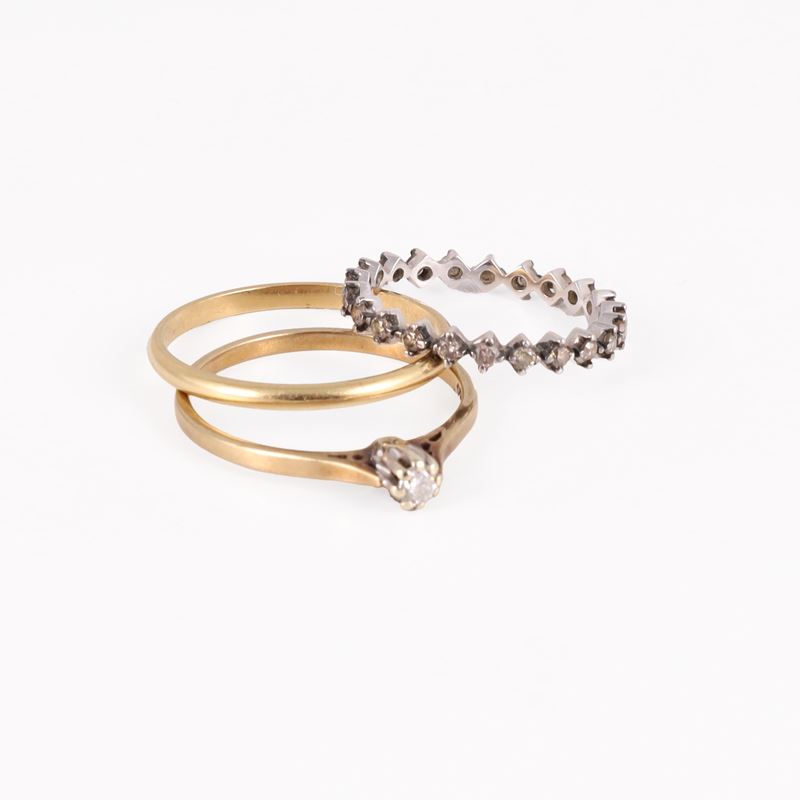 Fedi in oro 18KT e anello in oro 9KT con brillanti