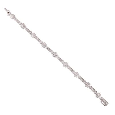Bracciale in oro bianco con motivi floreali e brillanti