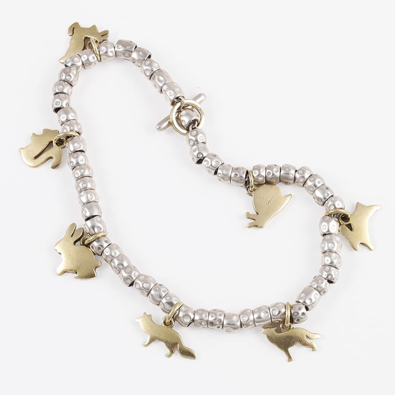 BRACCIALE, "DoDo" POMELLATO