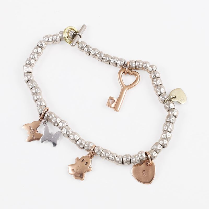 BRACCIALE, "DoDo" POMELLATO E PENDENTI