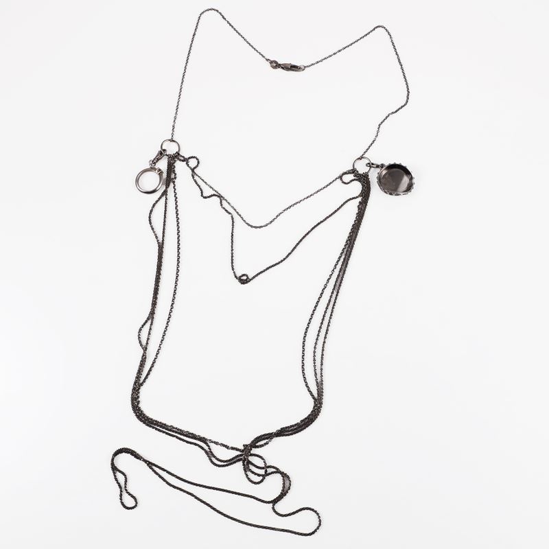 Collana in oro brunito con pendenti e brillante