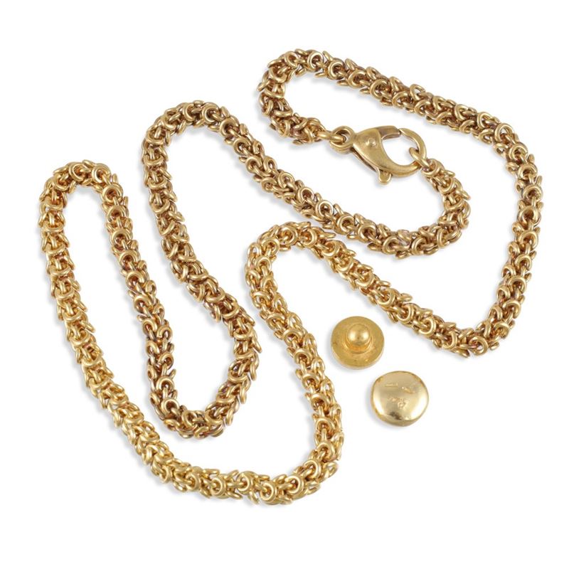 Pomellato, Collana a maglia tubolare con dischetto lenticolare in oro giallo 18Kt