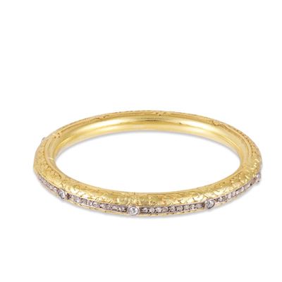 Bracciale rigido tubolare in oro 18Kt e platino con incisi motivi vegetali e diamanti