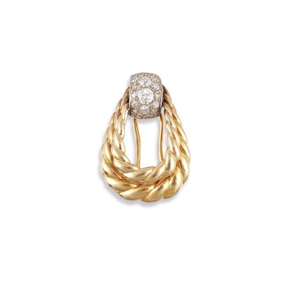 Spilla in oro giallo e bianco 18Kt con diamanti