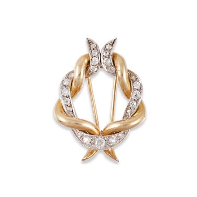 Spilla in oro giallo 18Kt e platino con diamanti europei