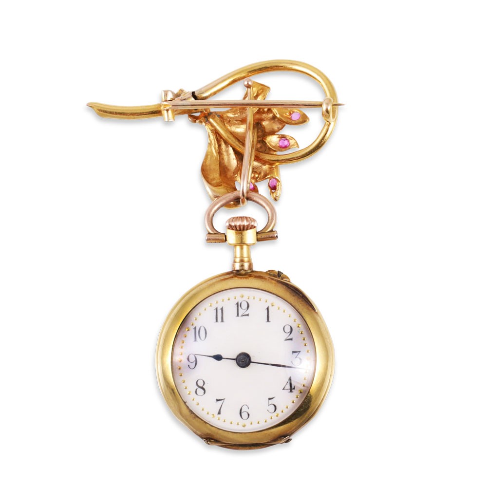 Spilla con orologio, oro giallo 18Kt, rubini e diamanti