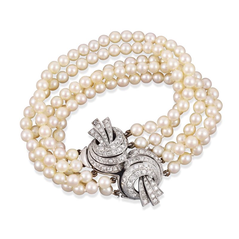 Bracciale a cinque fili di perle coltivate in oro 18Kt con diamanti