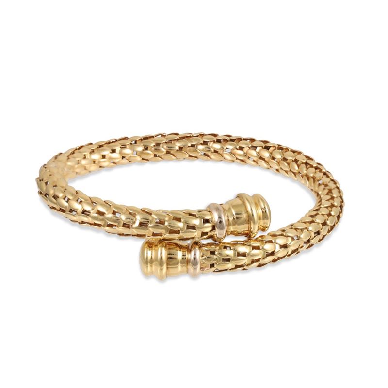 Bracciale semirigido in oro giallo 18Kt a maglia tubolare