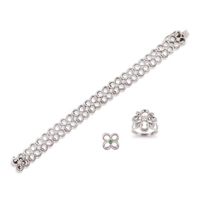Parure in oro bianco 18Kt con brillanti e pendente in smeraldo