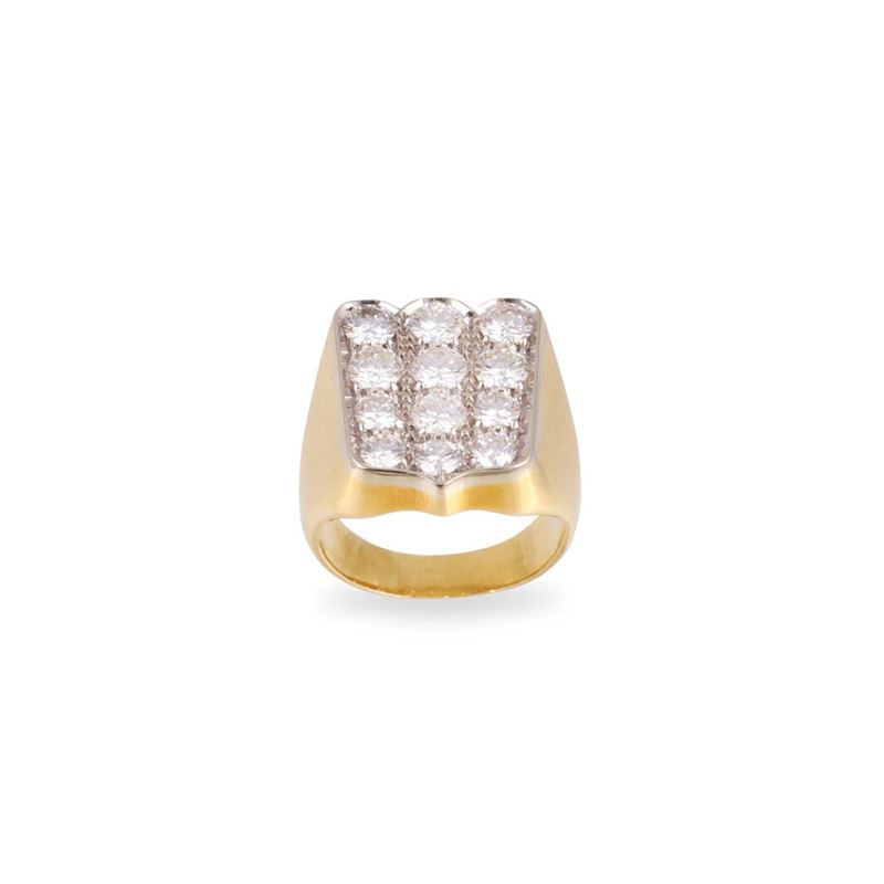 Anello a fascia in oro giallo e bianco con brillanti pavé