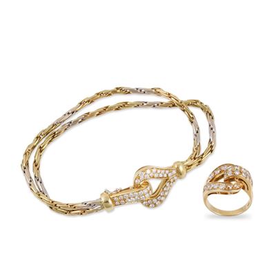 Parure in oro giallo e bianco 18Kt con bracciale a doppia catena e anello coordinato
