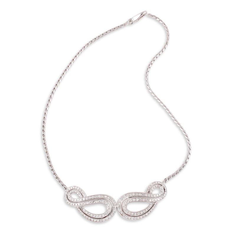 Girocollo in oro bianco 18Kt con motivo a volute in diamanti