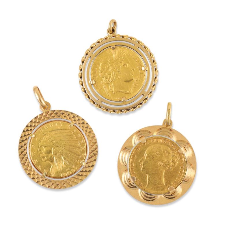 Tre pendenti in oro giallo 18Kt con moneta in oro