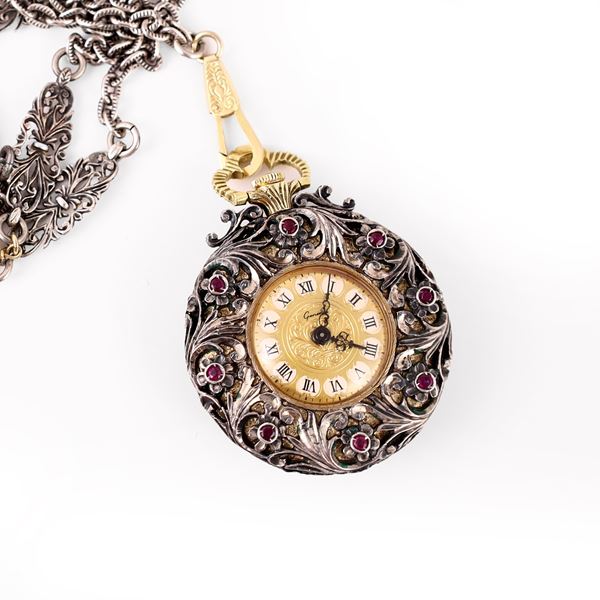 SILVER AND 18KT GOLD POCKET WATCH SET WITH RUBIES, ROSE-CUT DIAMONDS AND ENAMEL WITH A CHAIN IN SILVER, 18KT GOLD AND FRESHWATER PEARLS