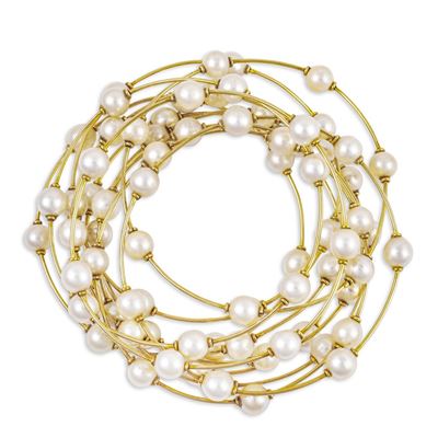 Bracciali rigidi in oro giallo 18Kt con perle coltivate