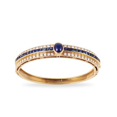 Bracciale rigido in oro giallo 18Kt con brillanti e zaffiri