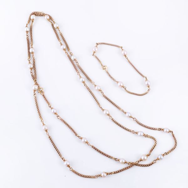 18KT GOLD LOT COMPRISING A NECKLACE AND BRACELET WITH CULTURED PEARLS