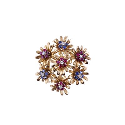Spilla circolare in oro giallo 18 kt con diamanti, rubini e zaffiri