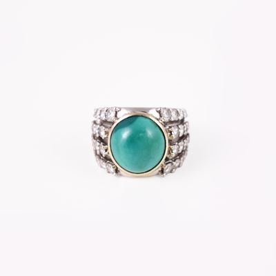 Anello in oro bianco 18 kt con turchese ovale cabochon e brillanti