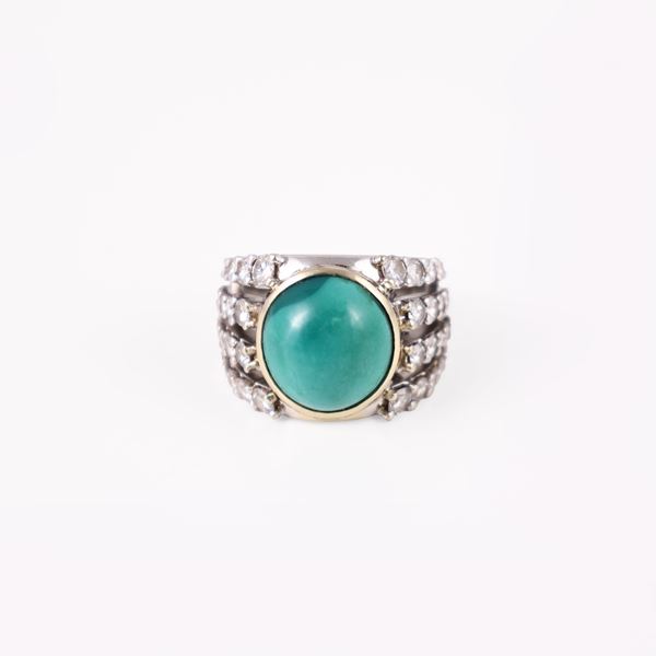 18KT GOLD RING SET WITH CABOCHON-CUT TURQUOISE AND DIAMONDS