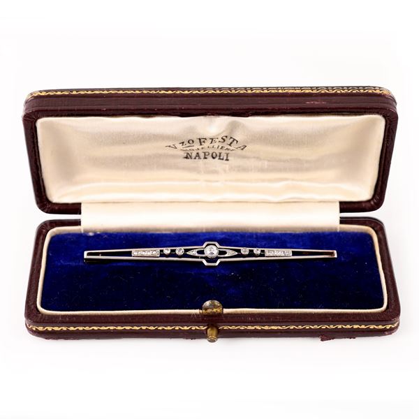 PLATINUM AND 18KT GOLD BROOCH SET WITH DIAMONDS