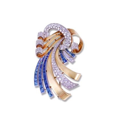 Spilla a nastro in oro 14K e platino, ornata con brillanti, zaffiri e diamanti baguette