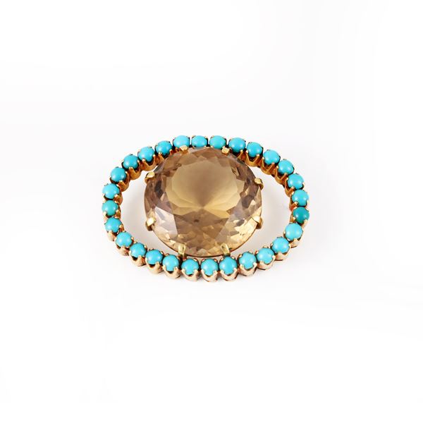 18KT GOLD PENDANT SET WITH TURQUOISES AND QUARTZ