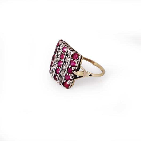 18KT GOLD AND SILVER RING SET WITH OLD-CUT DIAMONDS AND SYNTHETIC RED GEMSTONES