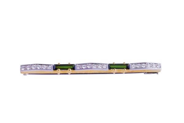 18KT GOLD BROOCH SET WITH DIAMONDS AND TOURMALINES, BY POMELLATO