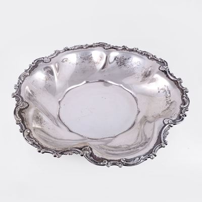 Centrotavola in argento 800/1000, corpo circolare a bordura mistilinea