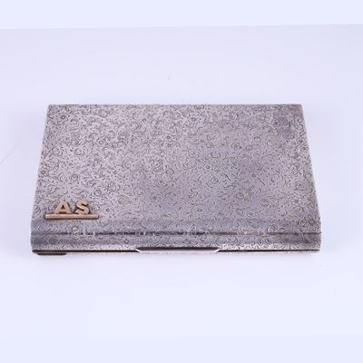 Trousse, argento 925/1000 inciso a motivi floreali con iniziali AS, custodia in suede