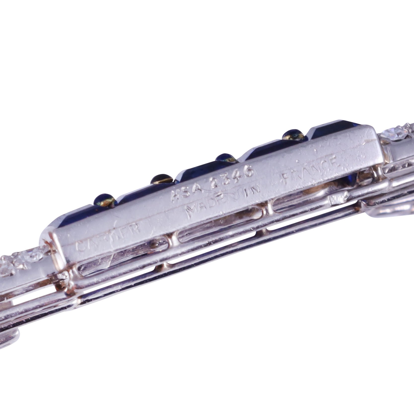 Cartier - Spilla decorativa in platino con diamanti in pavé e zaffiri carré