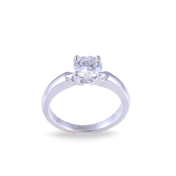 18KT GOLD RING SET WITH A DIAMOND