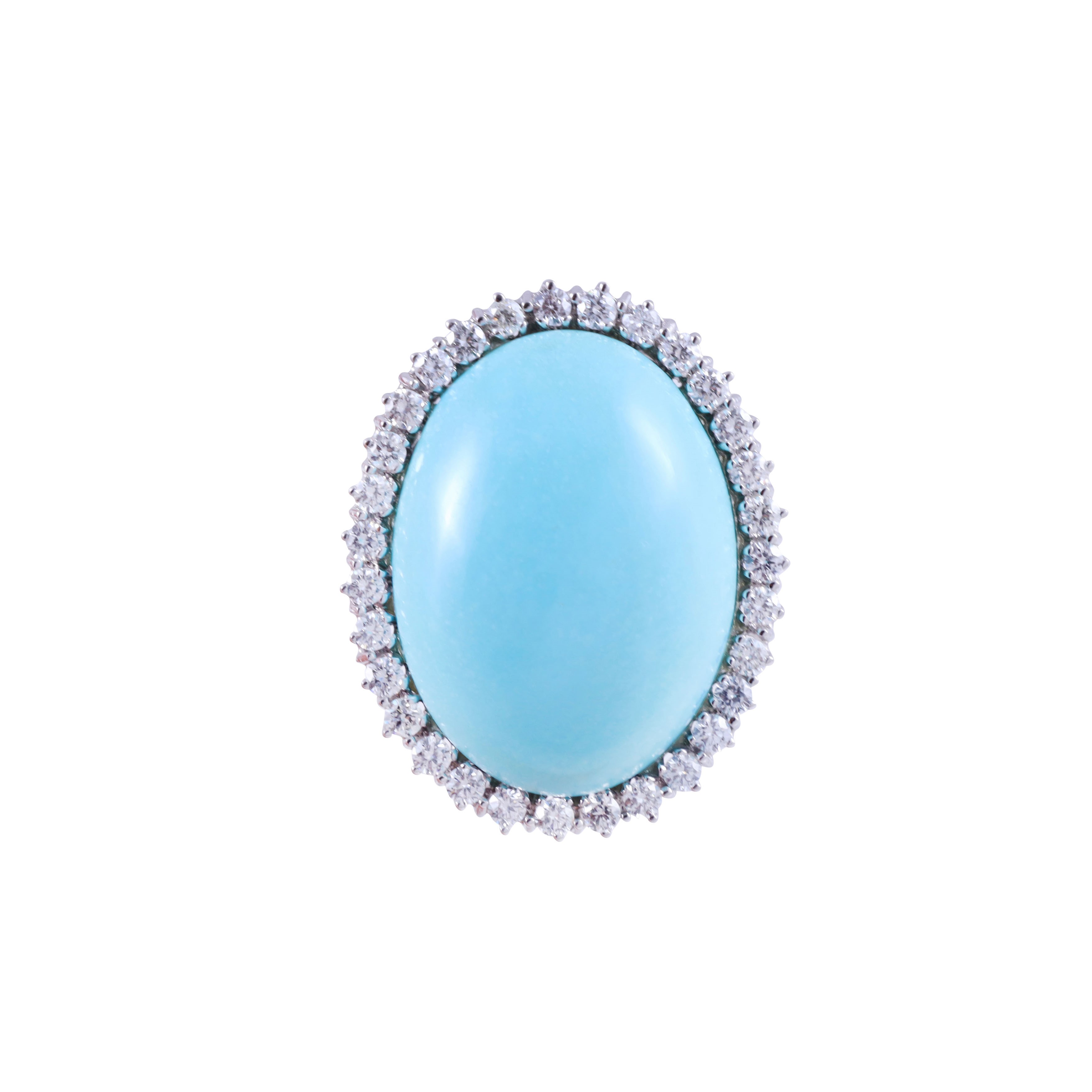 Anello in oro bianco 18 kt con turchese naturale cabochon e brillanti