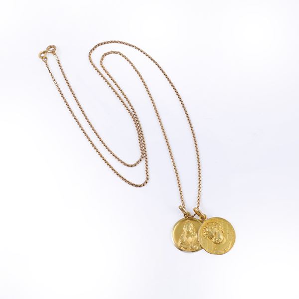 18KT GOLD LOT COMPRISING A CHAIN AND TWO MEDALS