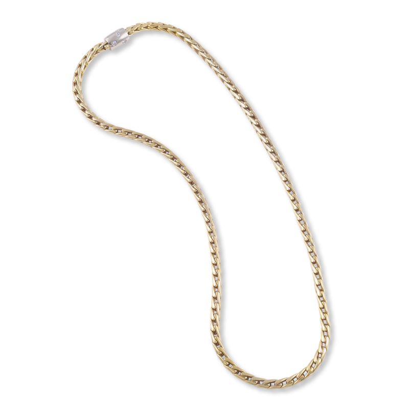 Pomellato - Girocollo a maglia spiga in oro giallo 18K con chiusura in oro bianco 18K e brillanti