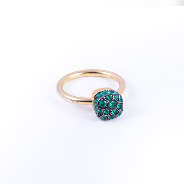 * 18KT GOLD RING SET WITH EMERALDS, BY POMELLATO "Nudo"
