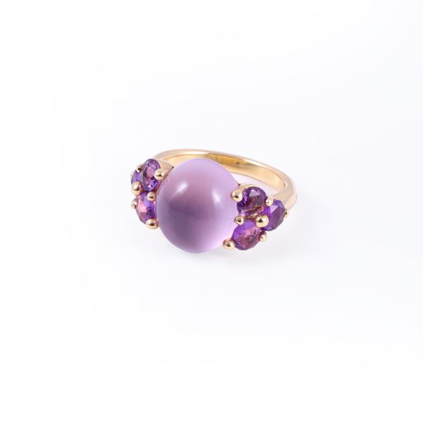 * 18KT GOLD RING SET WITH AMETHYSTS, BY POMELLATO "Luna"