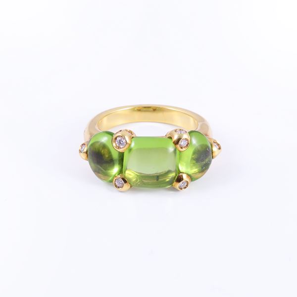 * 18KT GOLD RING SET BY PERIDOTS AND DIAMONDS, BY POMELLATO "Sassi"