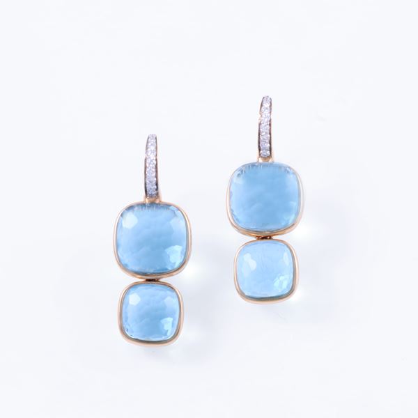 * 18KT GOLD EARRINGS SET WITH BLUE TOPAZ AND DIAMONDS, BY POMELLATO "Nudo"