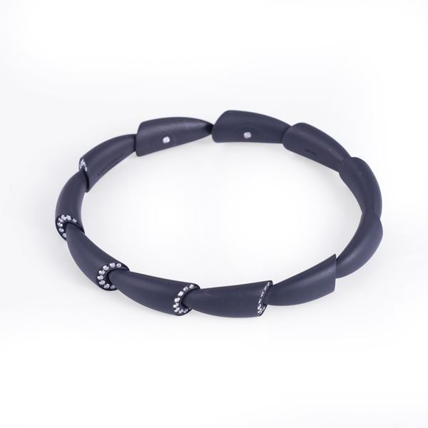 * TITANIUM SEMI-RIGID BRACELET SET WITH DIAMONDS, BY VHERNIER "Calla"
