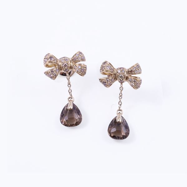 * 18KT GOLD EARRINGS SET WITH BROWN DIAMONDS AND QUARTZ, BY POMELLATO "Forever"