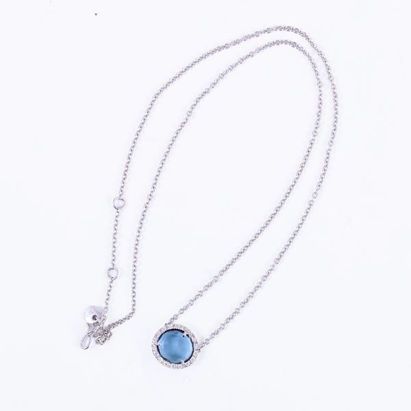* 18KT GOLD NECKLACE SET WITH DIAMONDS AND FLAT-CUT BLUE TOPAZ, BY POMELLATO "Colpo di fulmine"
