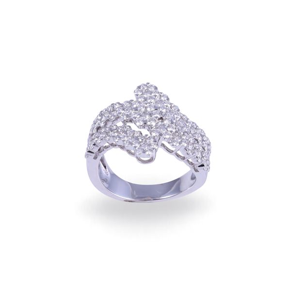 * 18KT GOLD RING SET WITH DIAMONDS, BY DÁMASO MARTÍNEZ