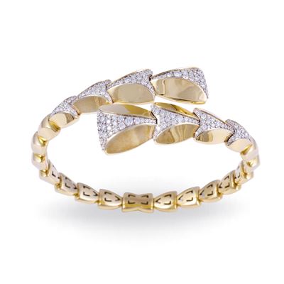 Dámaso Martínez, Bracciale semirigido a forma di serpente stilizzato in oro 18 carati con brillan...